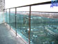 Balcony glass baluster. Metal, tempered glass