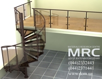 Spiral staircase with glass stairs and baluster