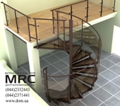 Spiral staircase with glass baluster