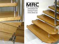 Mount of oak stairs to metal construction