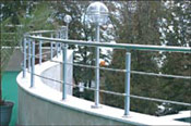 errace fencing from polished stainless steel and tempored glass 